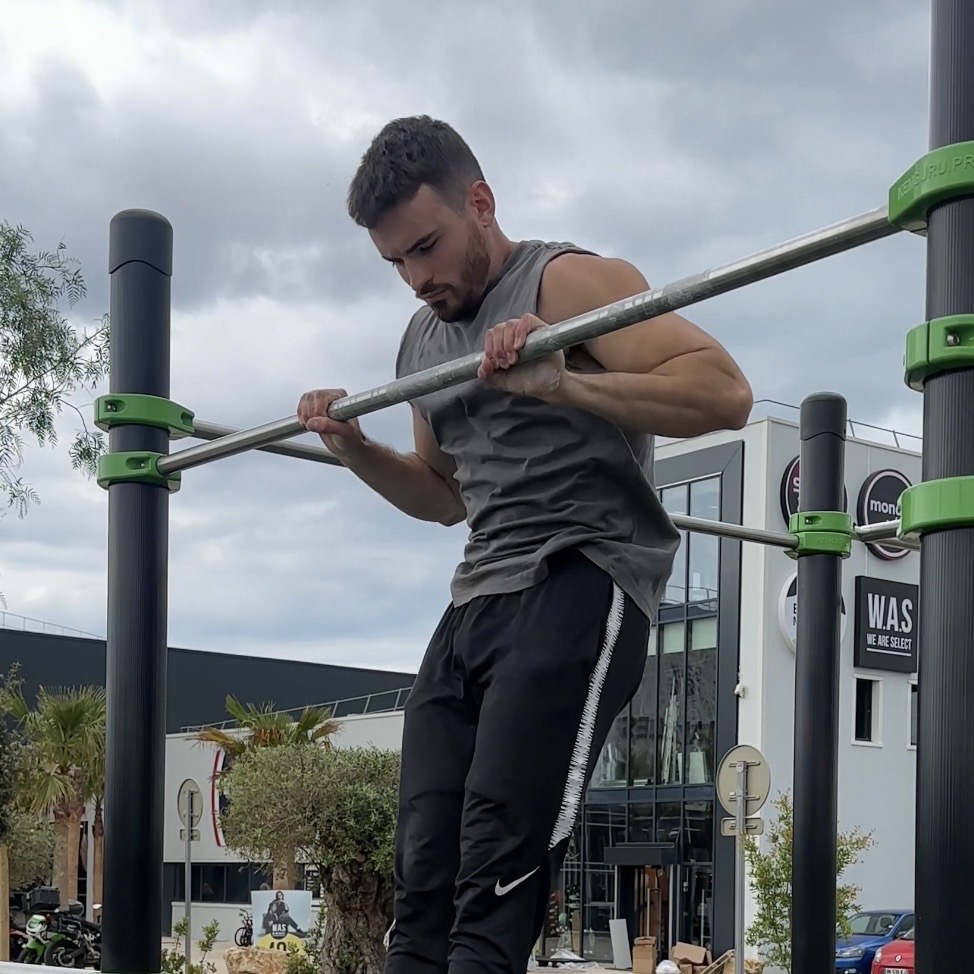 Première phase du muscle-up : Traction haute
